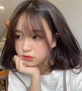 Tóc ngắn uốn xoăn hoặc uống chữ C ăn gian cho nàng mặt tròn